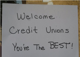 welcome credit unions sign, tuscaloosa credit union, underserved